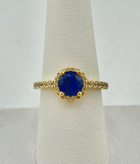 14k circle ring with big dark blue stone