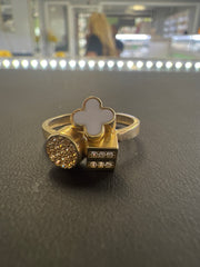 14k ring with many shapes and stones