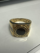 14k ring men with black onix stone and stones on the side