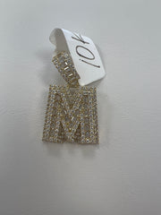 10k letter M pendant with Cz’s stones