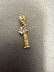 14k letter I pendant with crown on Cz’s stones .76g