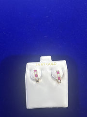 14k small ladies earring Huggies with pink stones