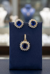 10k dark Blue stone set earrings and pendant with halo