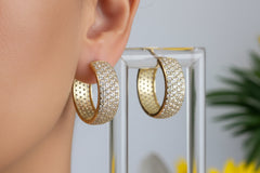 10k hoops small Huggies design stones all around