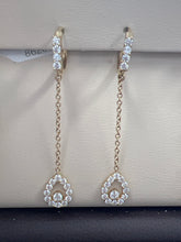 14k oval hanging earrings with many stones