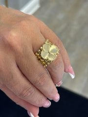 14k bracelet with flower its a bracelet and it’s ring convertible all in one piece