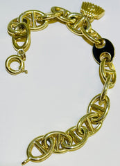 14k chain bracelet with black enamel design and hanging bag