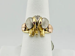 14k tri-colored elephant ring with red and white stones