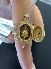 14k turtle ring with white and pink stones. Two baby turtles