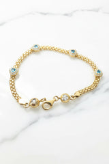 14k bracelet with heart in blue stones