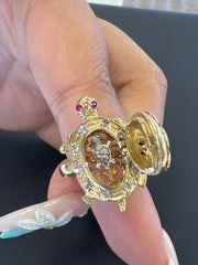 14k turtle ring with white and pink stones. Turtle inside