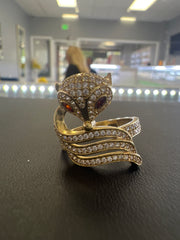 14k fox ring with many white and red stones