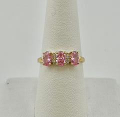 14k ring with three pink stones