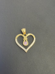 14k heart pendant with pink stone