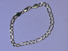 14k figaro bracelet 7”