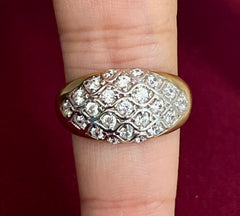 14k ring with many smaller stones