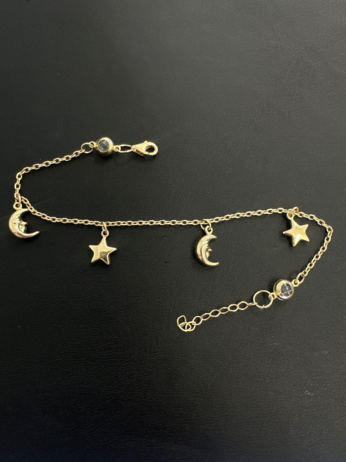 14k bracelet with charms 4.67g min star