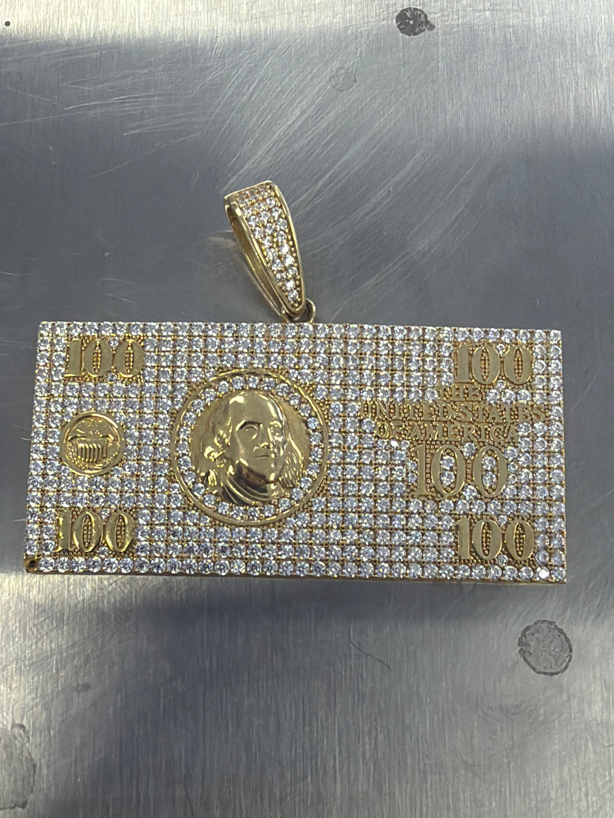 14k Money dollar pendant with stones