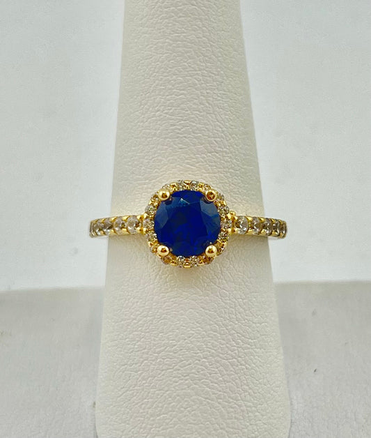 14k circle ring with big dark blue stone