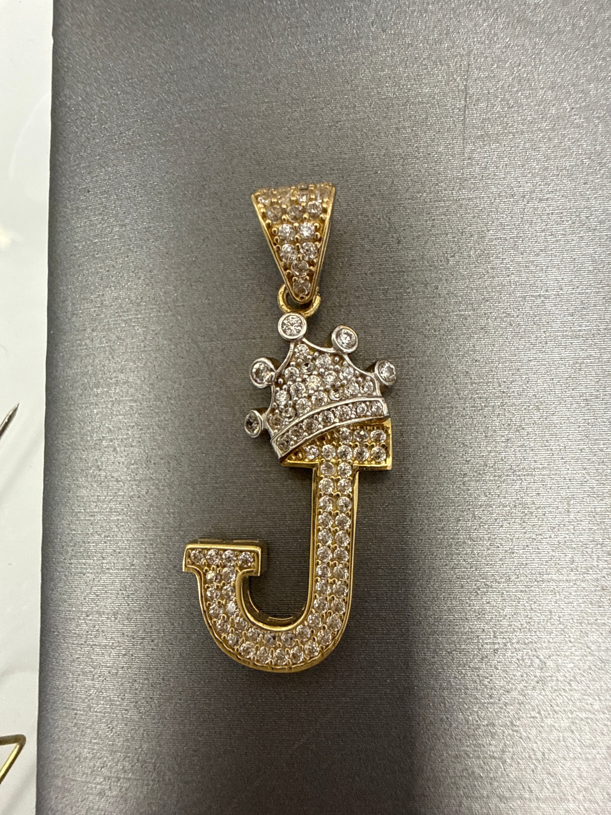 14k letter J pendant with crown on Cz’s stones 2.93g