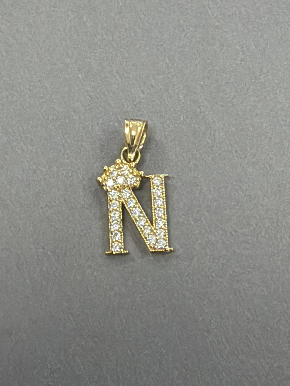 14k letter N pendant with Cz’s stones
