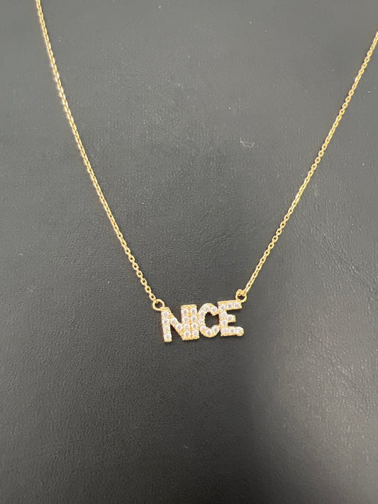 14k thin necklace saying “NICE”