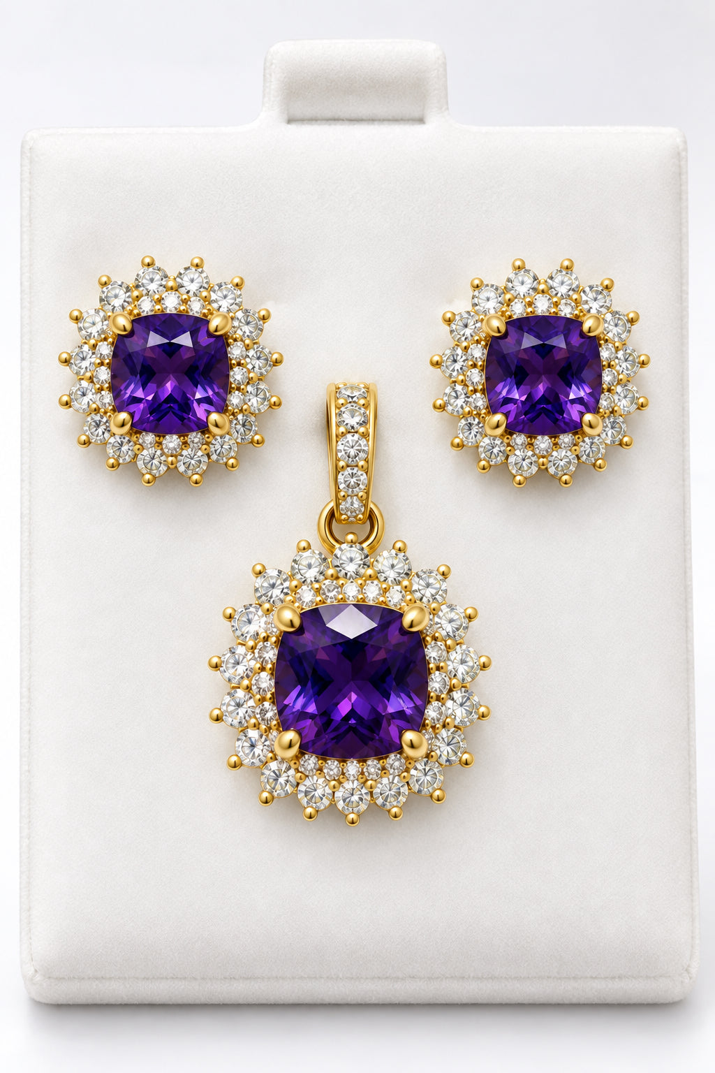 14k Earring and pendant in purple gems set in a floral-inspired sunburst halo design consisting of an inner ring of smaller round accents and an outer scalloped border of marquise-shaped