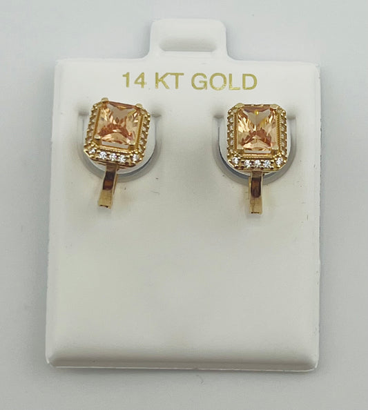 14k earrings with orange and white stone