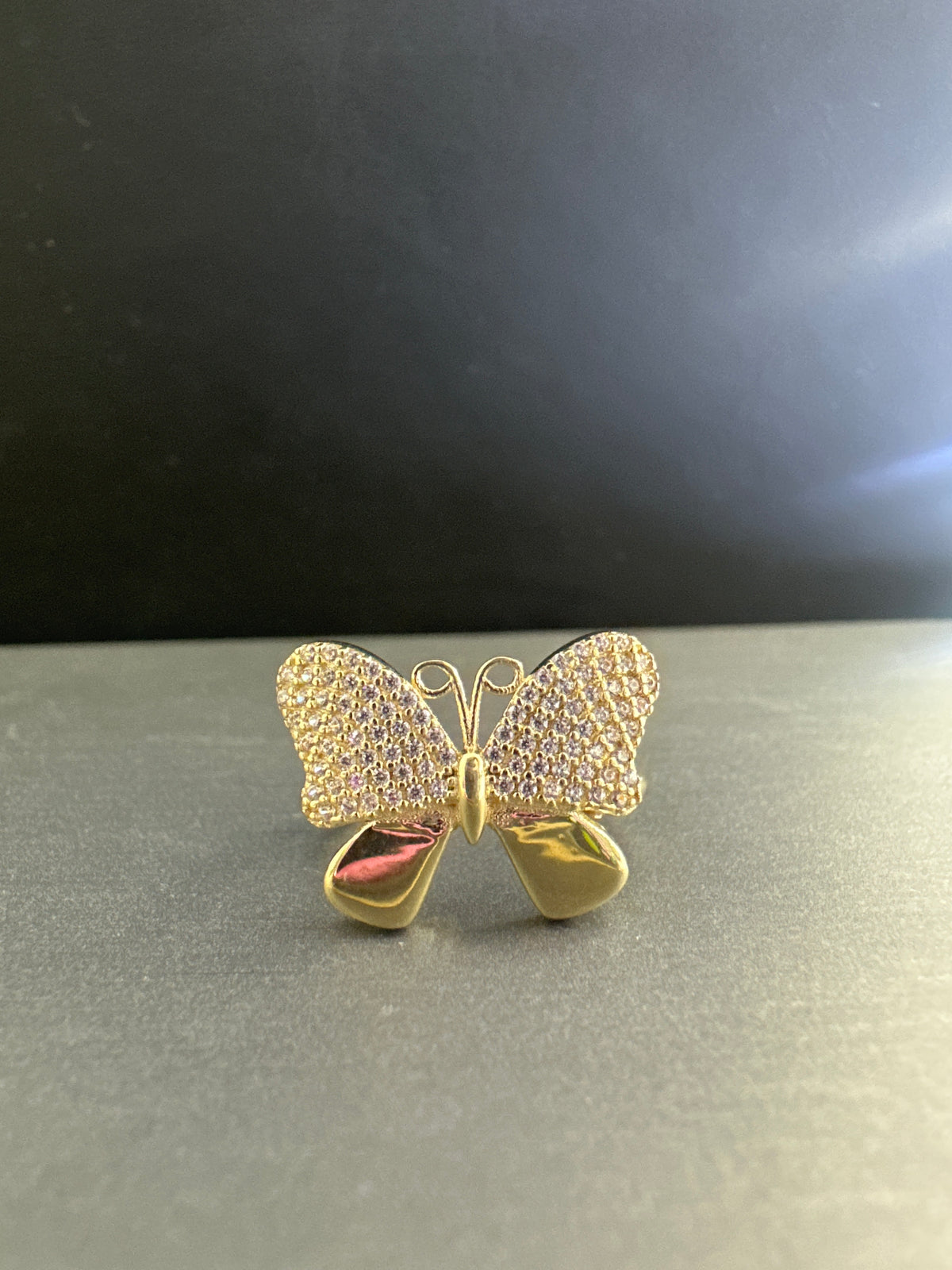 14k butterfly ring with many stones