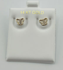 Baby earing butterfly with stones