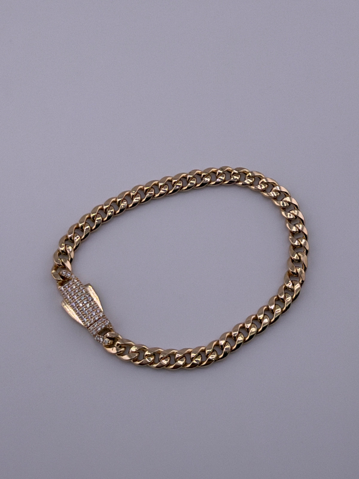 14k monaco bracelet with stones on lock