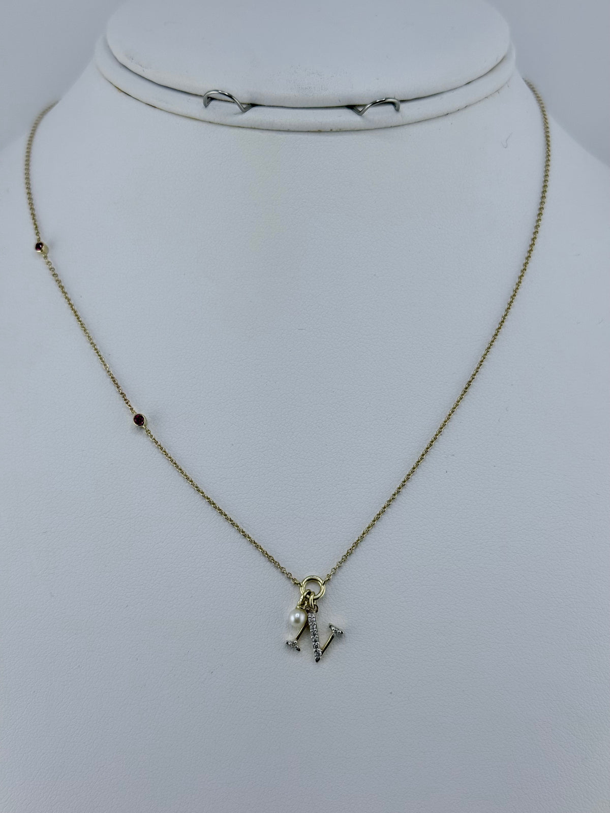 10k letter N and a necklace with diamond ruby and pearl