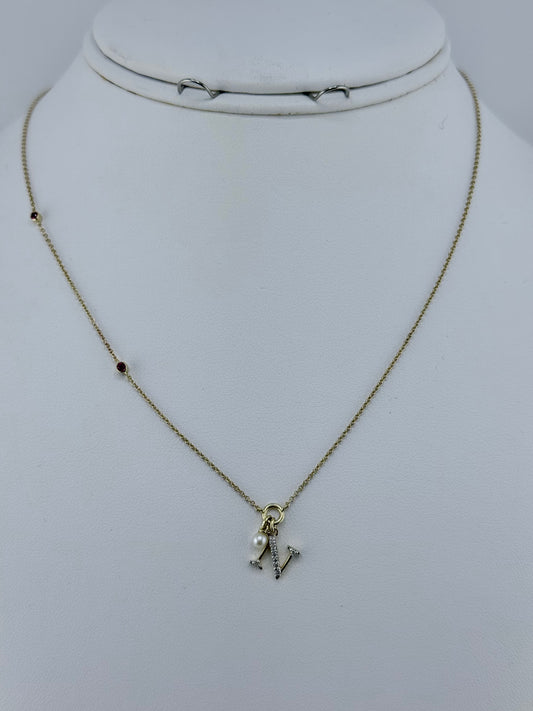 10k letter N and a necklace with diamond ruby and pearl