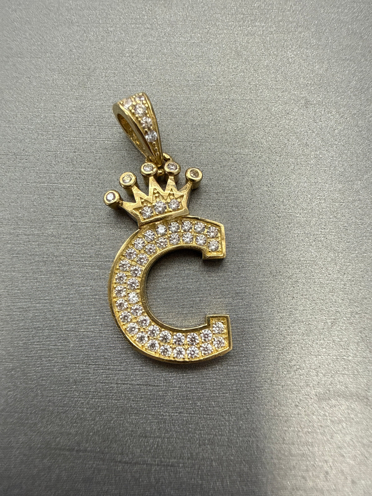 14k letter C pendant with crown and CZ’s stones