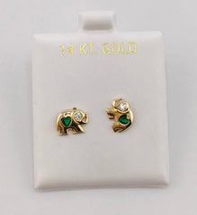 Baby earing elephant with green heart