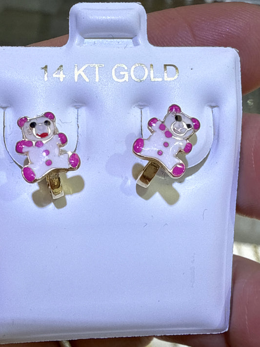 Baby earing blue stone