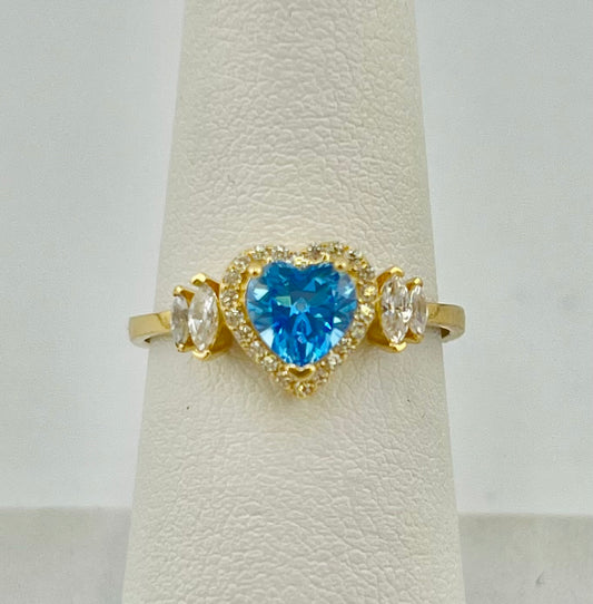 14k heart ring with big light blue stone