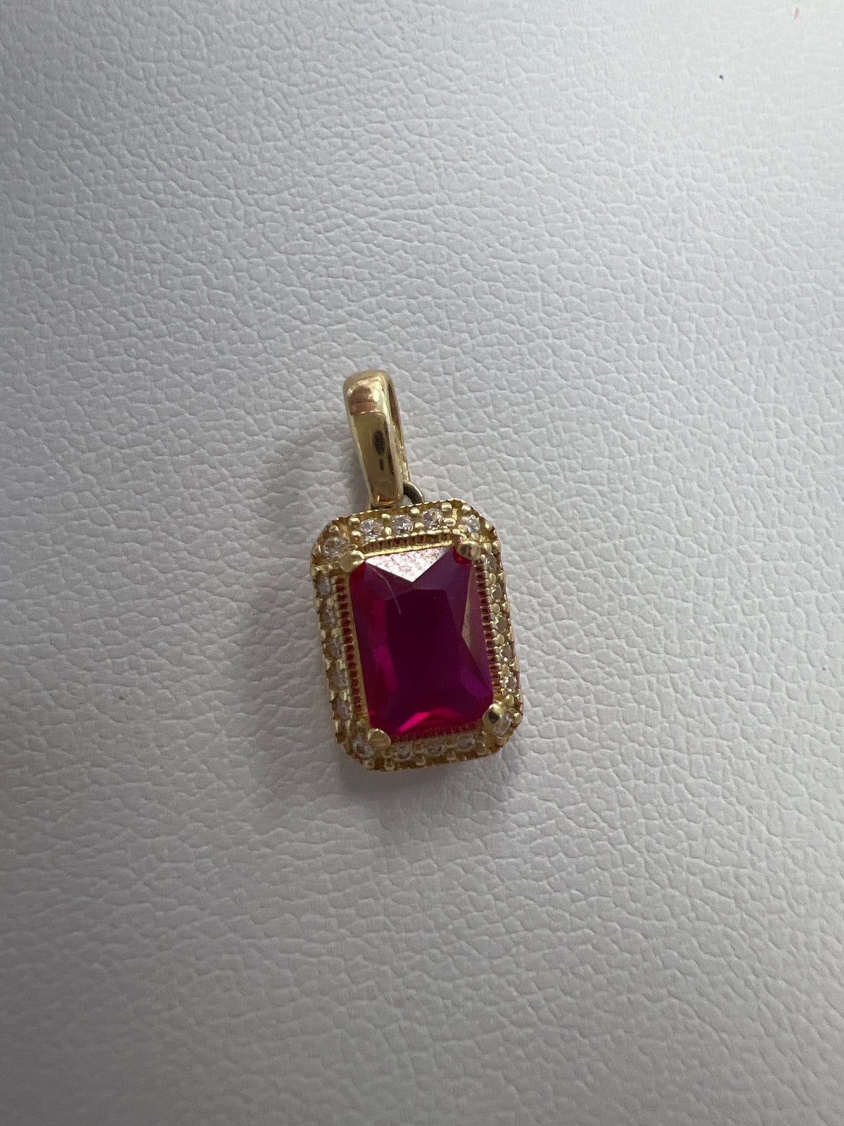 14k rectangle red stone pendant with white stones