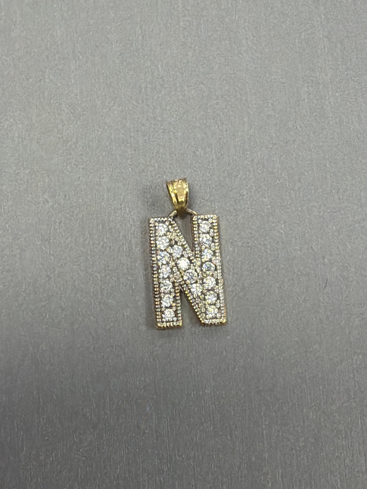 14k letter N pendant with Cz’s stones