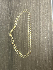 10k bracelet cuban diamond cut.