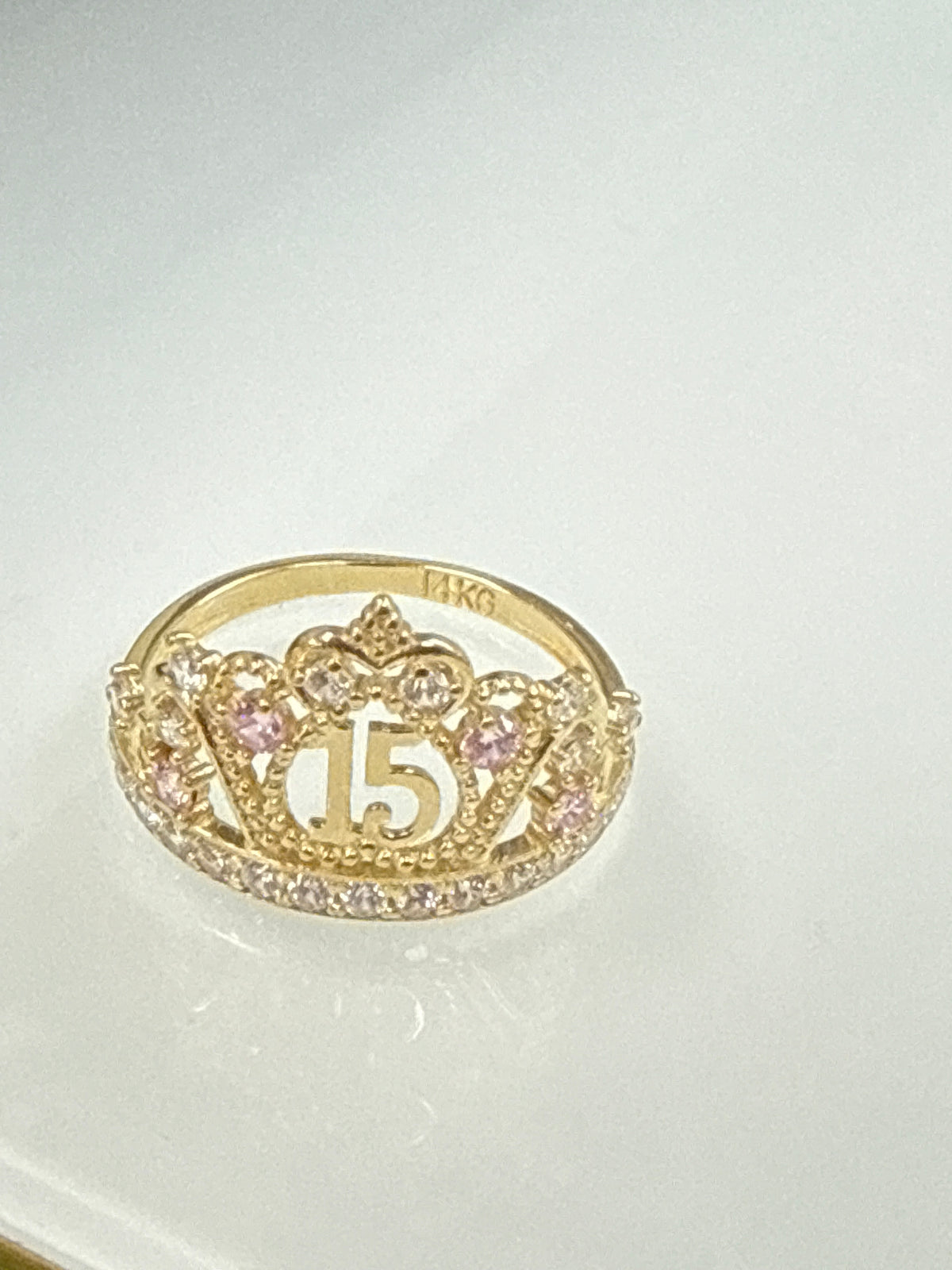 14k Quince (15) crown with stones