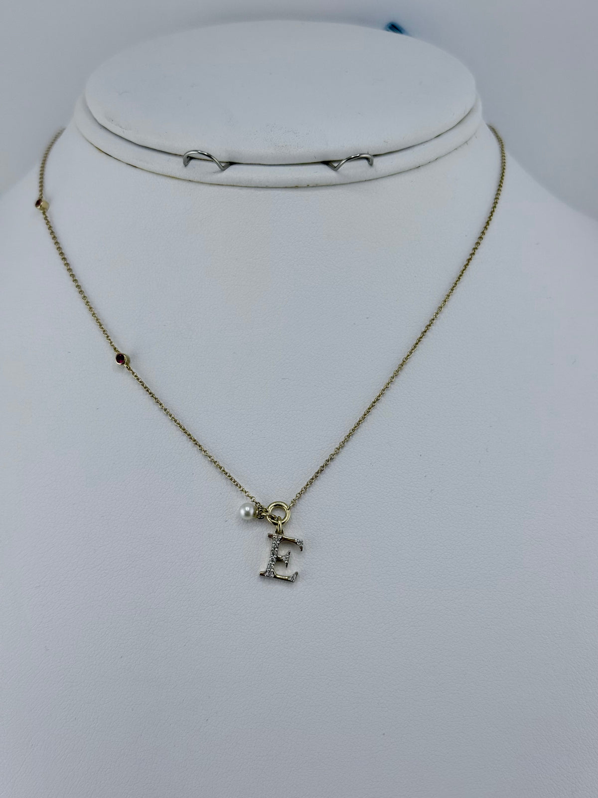10k letter E necklace with diamond ruby and pearl