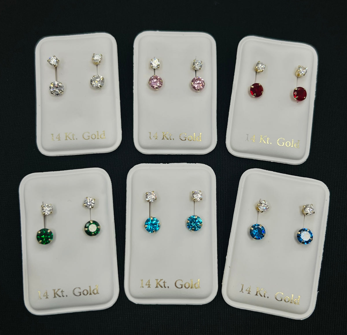 14k ladies medium colored stone and white stone earring