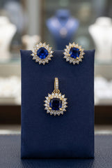 10k dark Blue stone set earrings and pendant with halo