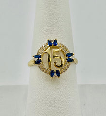 14k Quince (15) blue circle with stones
