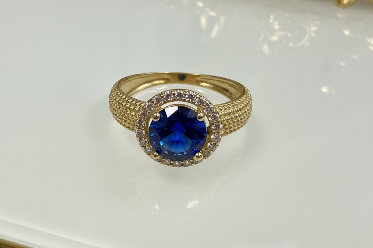 14k Blue stone with halo