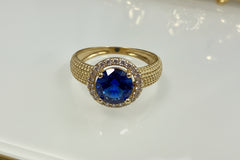 14k Blue stone with halo