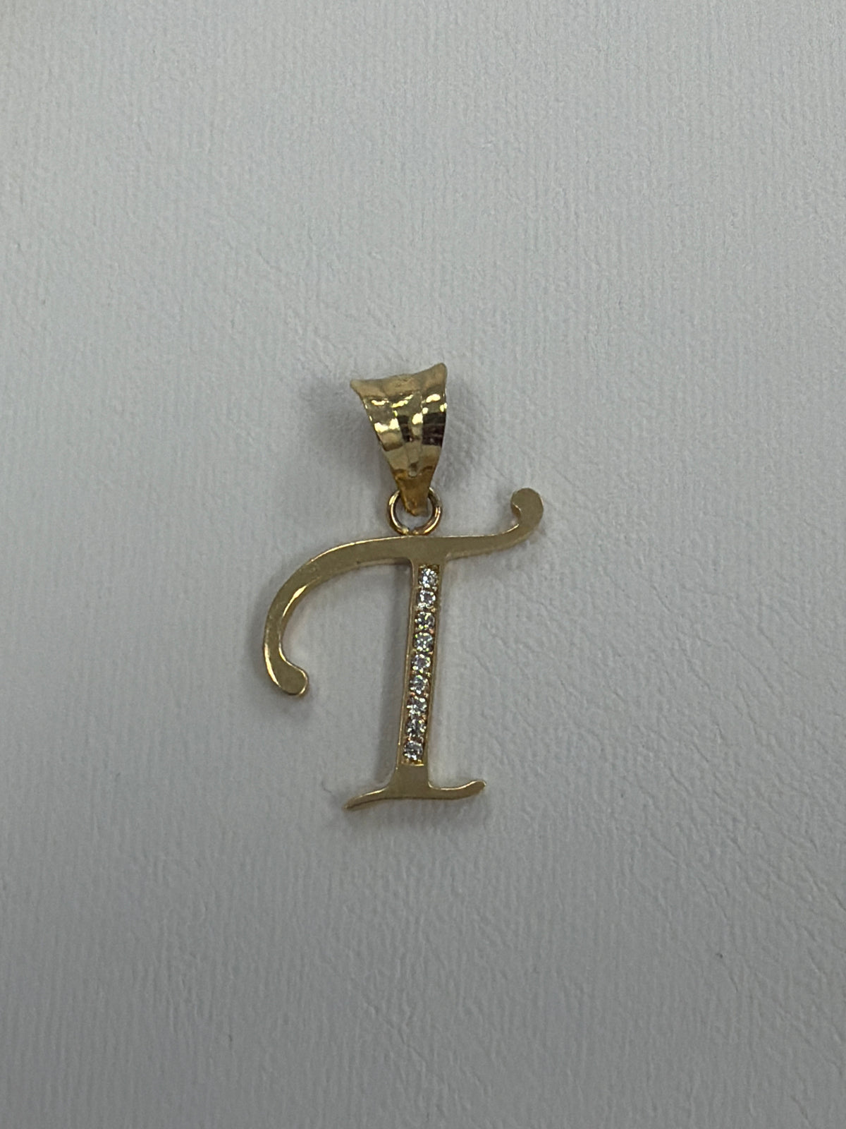 14k letter T pendant with Cz’s stones