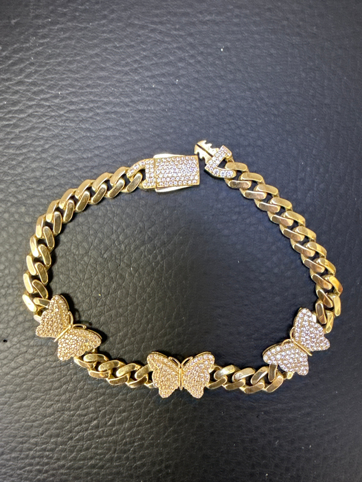 14k bracelet Monaco style with stoned butterflies