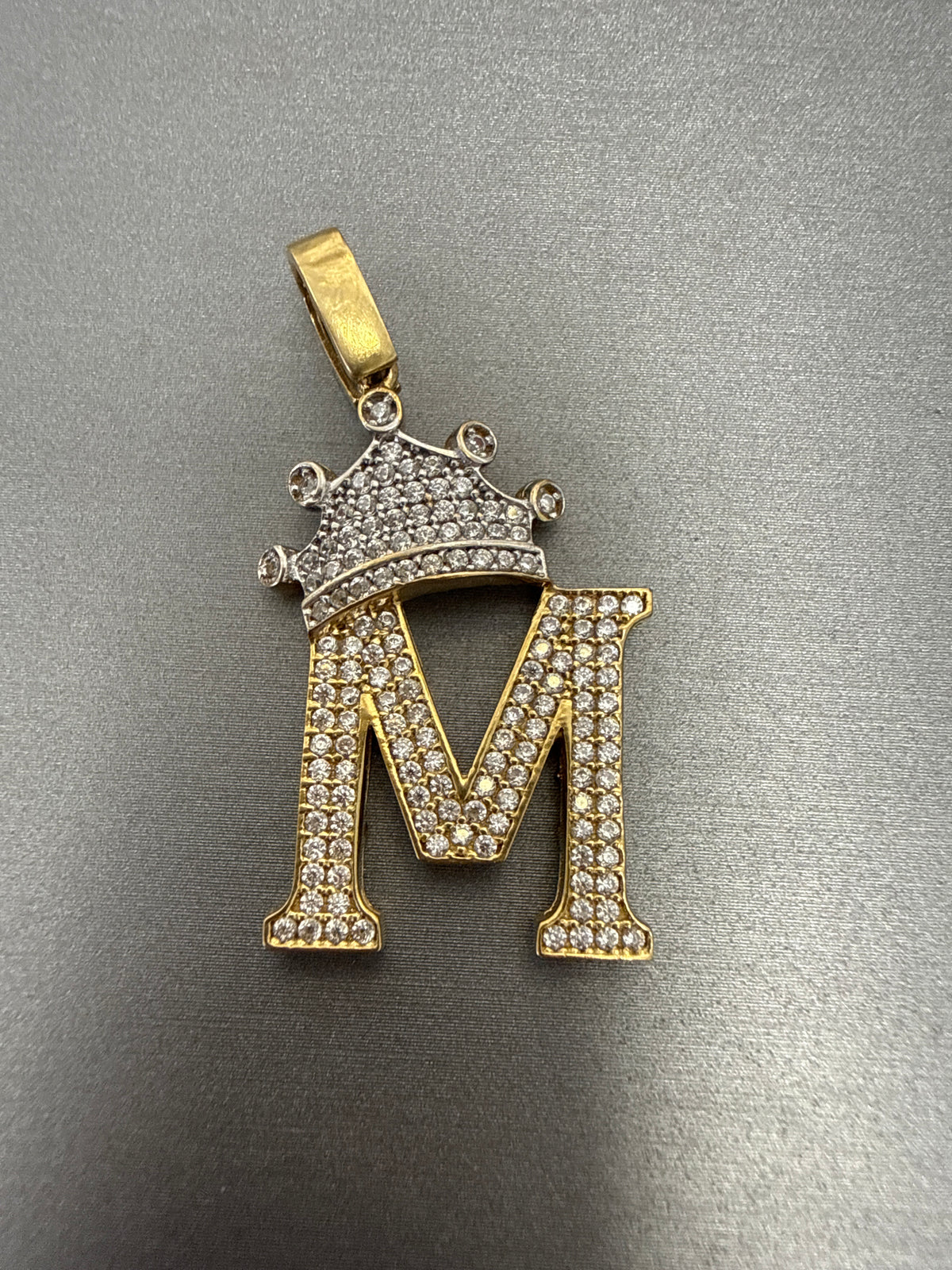 14k letter K pendant with crown on Cz’s stones white gold on crown
